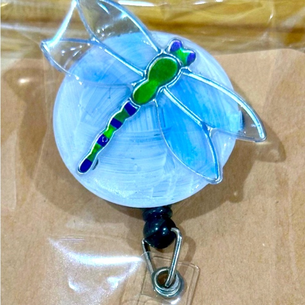 Dragonfly badge reel with belt clip